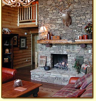 Fireplace in great room of Lookout Lodge cabin rental near Pigeon Forge tn in Wears Valley